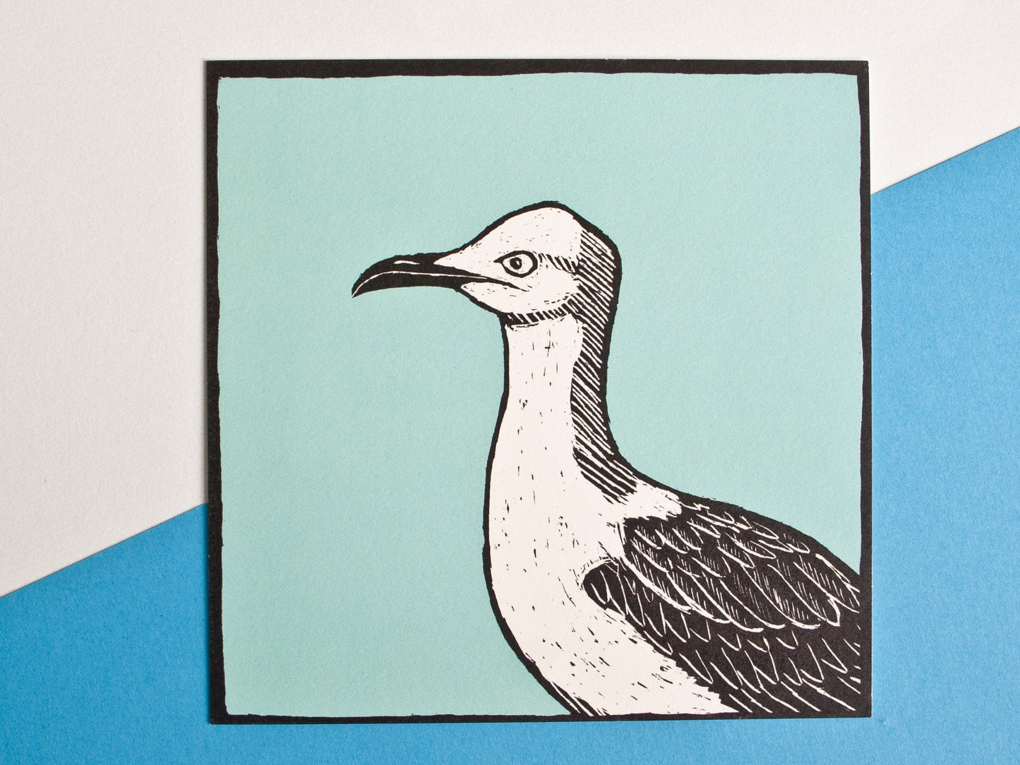 Quadratische Postkarte Möwe