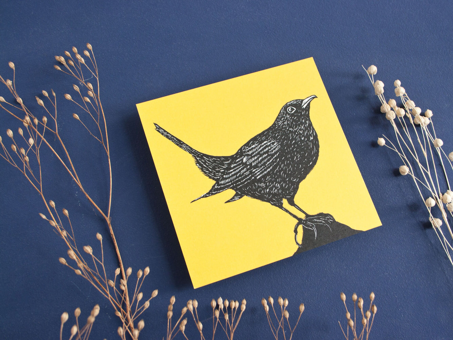 Quadratische Postkarte Amsel
