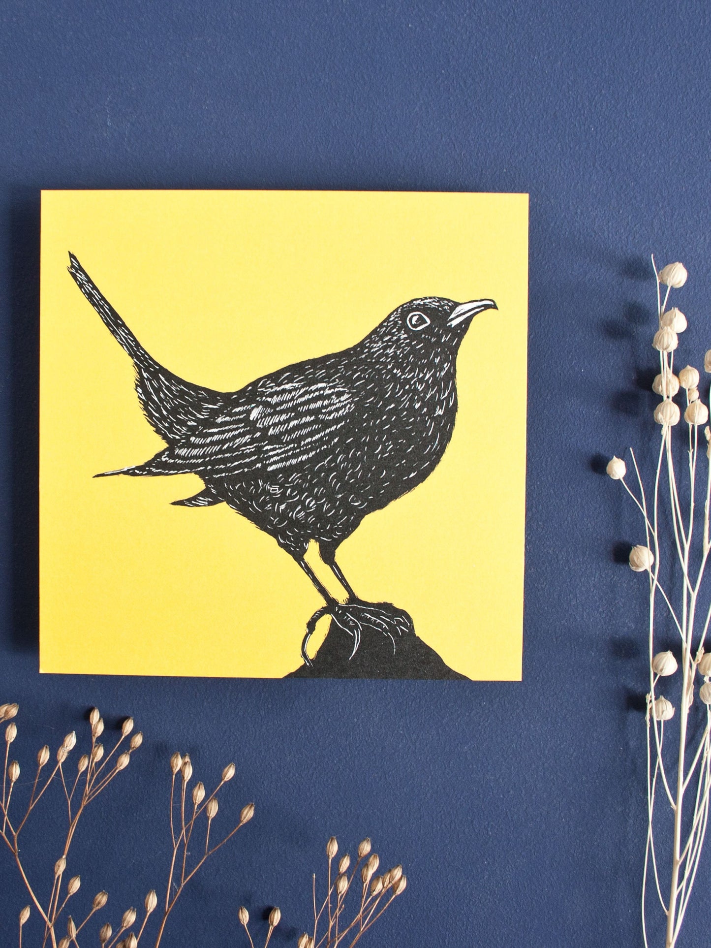 Quadratische Postkarte Amsel