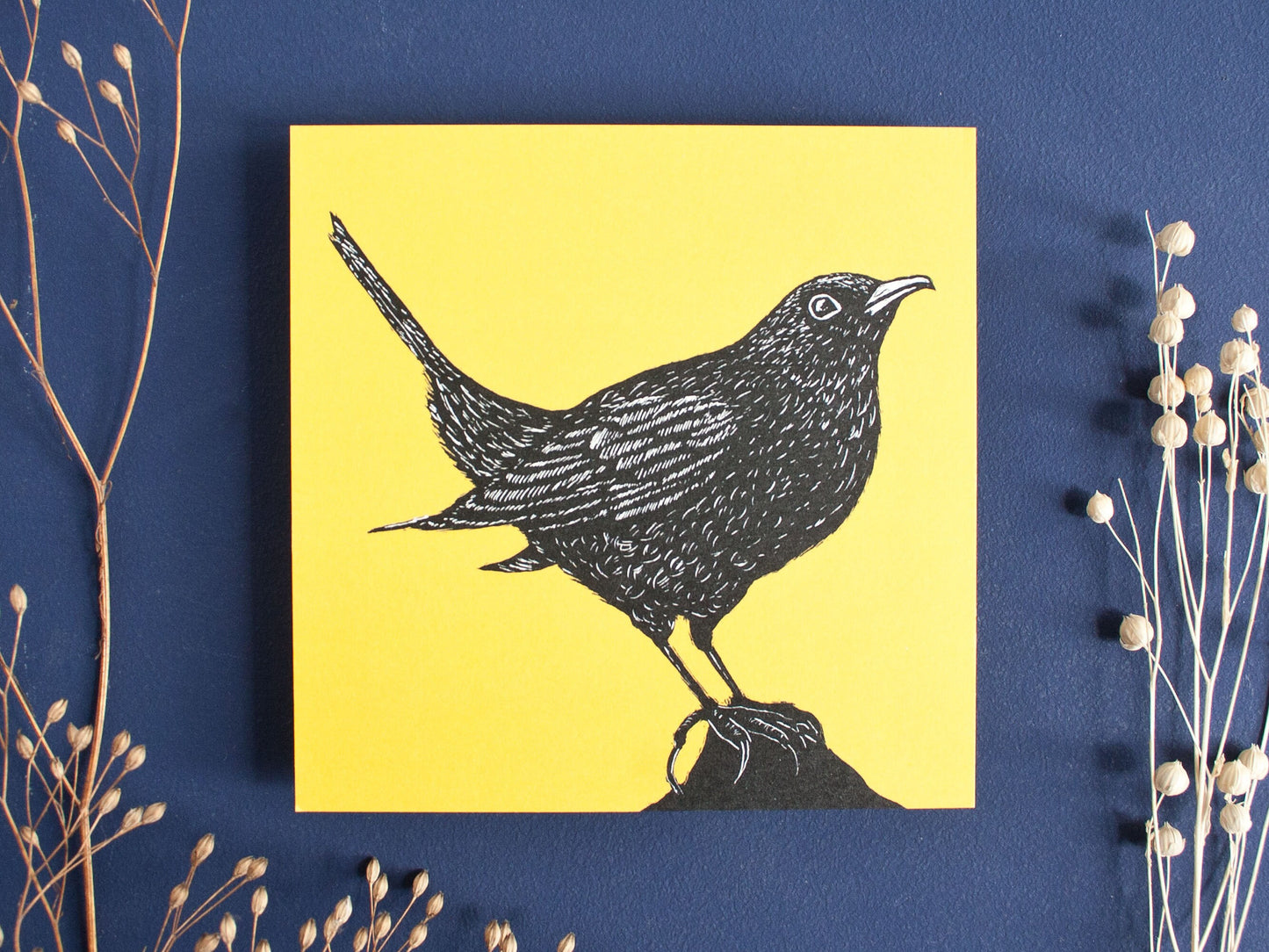Quadratische Postkarte Amsel