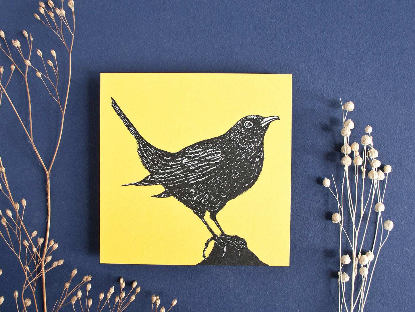 Quadratische Postkarte Amsel