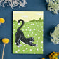 Postkarte A6, Katze auf Löwenzahnwiese