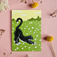 Postkarte A6, Katze auf Löwenzahnwiese