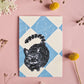 Postkarte „Katze auf Marmorboden“
