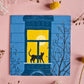 Quadratische Postkarte Katze im Fenster